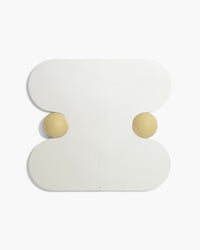 Squeeze sculptural wall mirror in Sand by RTH